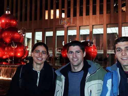 The family at a plaza in New York City at night, near the restaurant that inspired this recipe